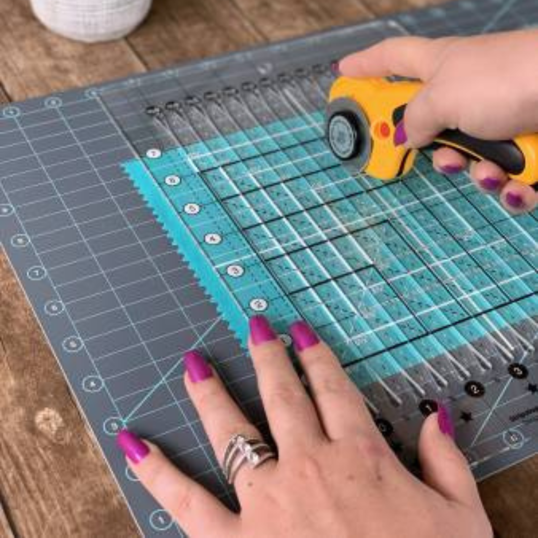 Creative Grids cutting mat used with stripology ruler.