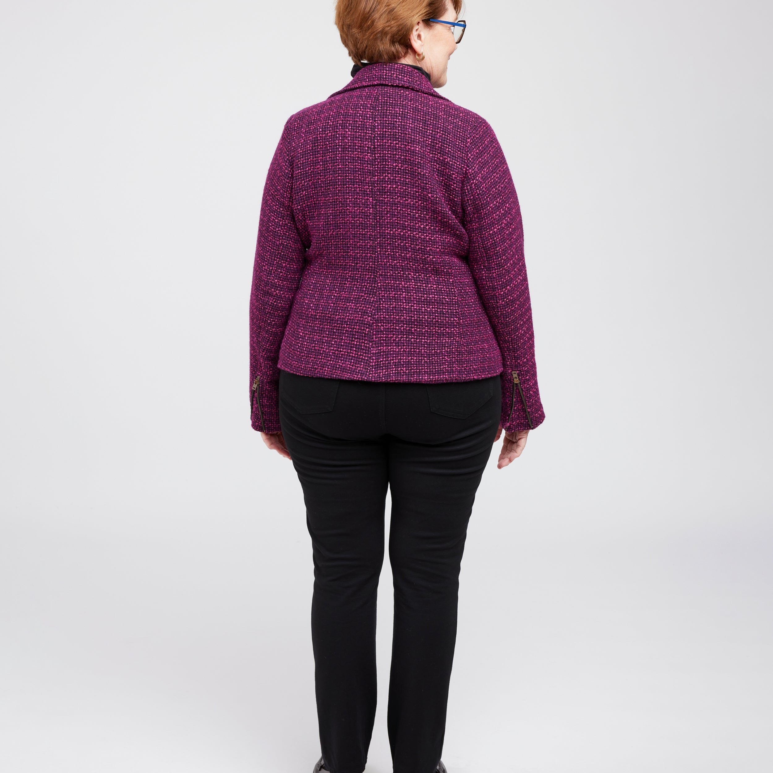 Person wearing a purple quilted jacket on a white background. This biker jacket is the Canton Moto Jacket sewing pattern from Cashmerette.
