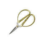 Gold handled embroidery scissors.