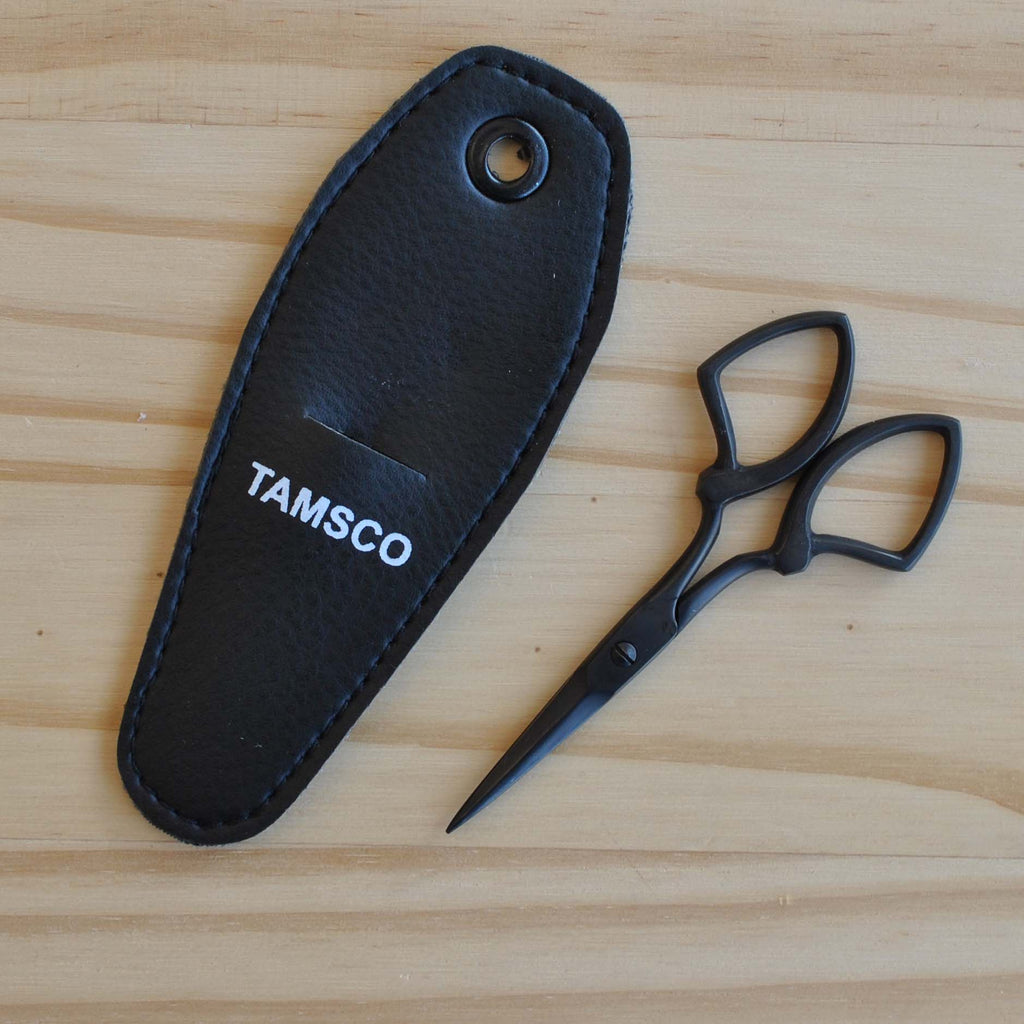 Black embroidery scissors with Art Deco inspired design.