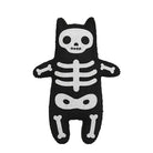 Black cat-shaped skeleton toy on a white background