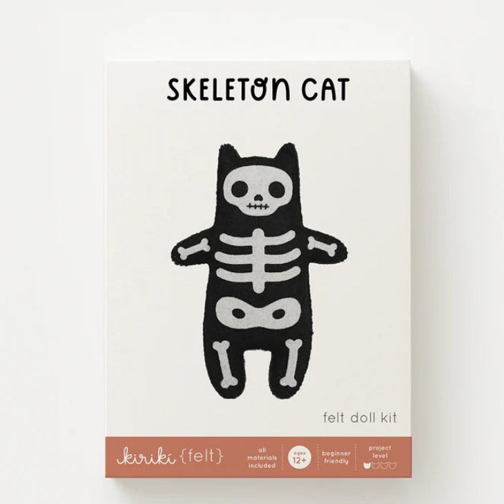 Skeleton cat felt doll kit packaging on a white background