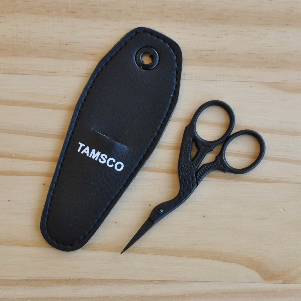 Black stork embroidery scissors.