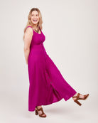 Woman wearing a bright pink dress on a white background. This is the Holyoke Maxi Dress & Skirt sewing pattern from Cashmerette.