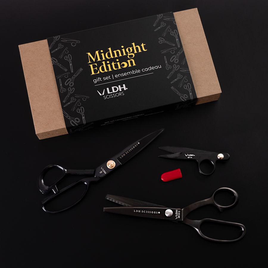 Black scissor gift set that includes black pinking shears, black thread snips, and black 9 inch fabric shears.