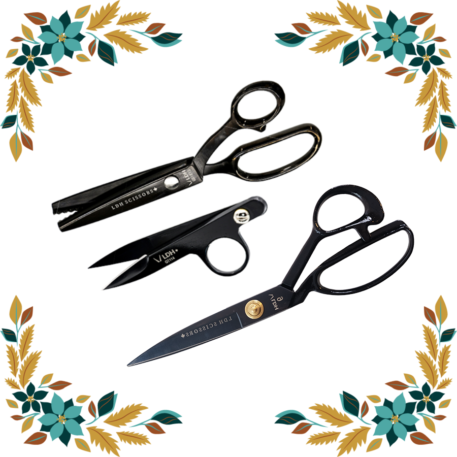 Black scissor gift set that includes black pinking shears, black thread snips, and black 9 inch fabric shears.