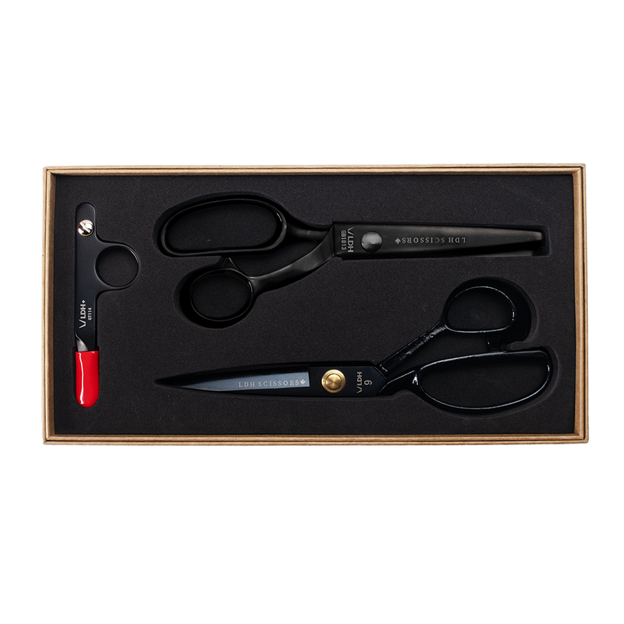 Black scissor gift set that includes black pinking shears, black thread snips, and black 9 inch fabric shears.