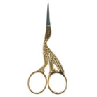 Stork embroidery scissor with gold coloured handle.