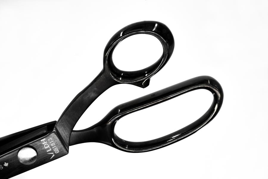 Black pinking shears handle detail.