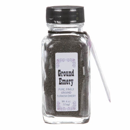 Bottle of ground emery.